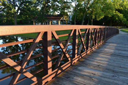 Walking across Fox River on Bridge in Burlington, Wisconsin in Summerの写真素材