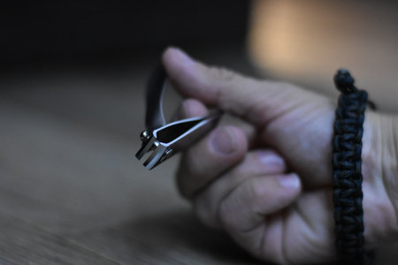Holding a Nail Clipper in my Hand