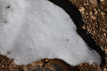 Patch of Snow on Rocky Ground, Winter in Coloradoの写真素材