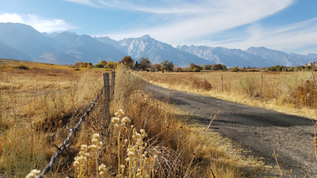 One Lane Back Road, Rural Alabama Hills Landscape, Mountains in Californiaの写真素材