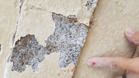 Scraped Finger on Left Hand while Remodeling a Brick Houseの写真素材