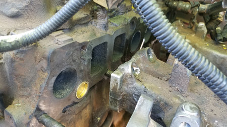 Working on a 1994 Vehicle, New Freeze Plug Installed on Engine Blockの写真素材