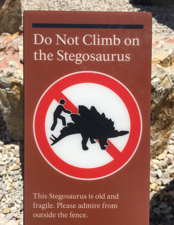 Do Not Climb on the Stegosaurus Sign at Dinosaur National Monumentの写真素材