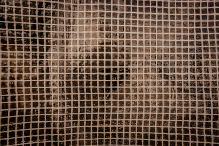Background net texture in dark brown colorsの写真素材