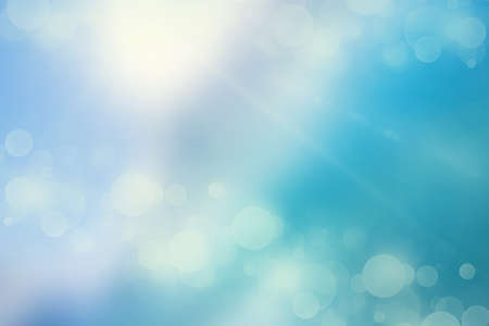 Bokeh lights on a cold blue backgroundの写真素材