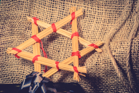 Christmas star made of straws in vintage colors