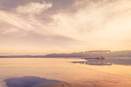 Ice on a frozen lake in the morning sunrise