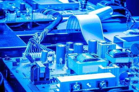Motherboard with capacitors and chips in blue colorの写真素材