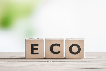 Eco word sign on wooden cubes on a tableの写真素材