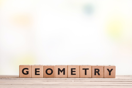Geometry lessons sign on a classroom tableの写真素材