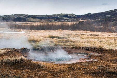 Geothermal puddle with boiling water in Icelandの写真素材