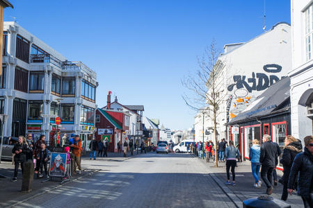 REYKJAVIK, ICELAND - APRIL 9 - 2016: Reykjavik city with people in the streetsのeditorial素材