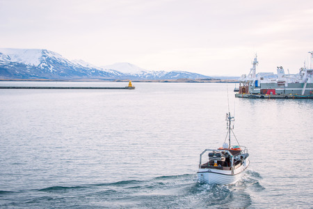REYKJAVIK, ICELAND - APRIL 9 - 2016: Fishing boat in Iceland on it's way out to seaのeditorial素材