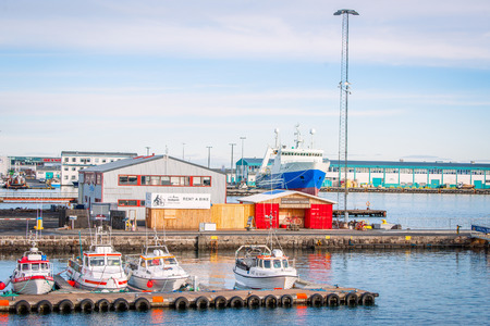 REYKJAVIK, ICELAND - APRIL 9 - 2016: Boats in the water at the harbor of Reykjavik in Icelandのeditorial素材