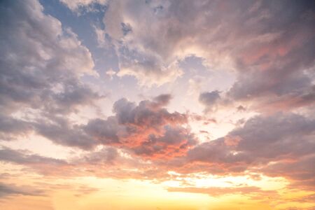 Dramatic sky with beautiful colors after the sunset in the summer