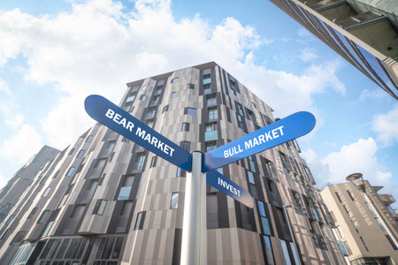 Bull or bear stock market direction sign in front of a large building