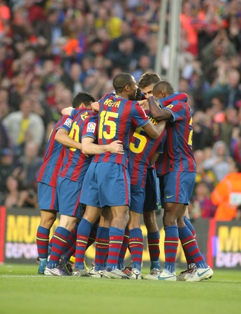 FC Barcelona players enjoying during a Spanish League match between FC Barcelona and Valladolid at the Nou Camp Stadium on May 16, 2010 in Barcelona, Spainのeditorial素材