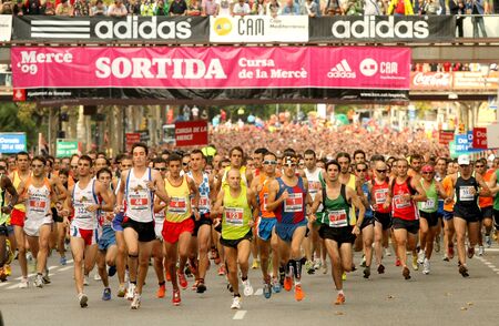 Runners on start of Cursa de la Merce popular race in Montjuich Mountain on September 28, 2009 in Barcelona, Spainのeditorial素材