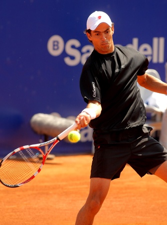 Colombian tennis player Santiago Giraldo in action during his match against Rafael Nadal of Barcelona tennis tournament Conde de Godo on April 21, 2011 in Barcelonaのeditorial素材