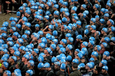Triathletes on Start of the Barcelona Garmin Triathlon event at Barcelona beach on October 16, 2011 in Barcelona, Spainのeditorial素材