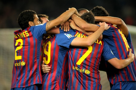 Group of FC Barcelona players celebrating goal during the spanish league match between FC Barcelona and RCD Mallorca at the Nou Camp Stadium on October 29, 2011 in Barcelona, Spainのeditorial素材