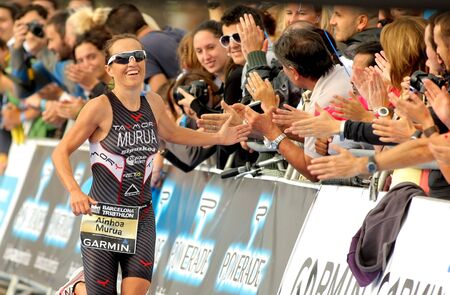 Ainhoa Murua of Spain in action finishing Barcelona Garmin Triathlon event at Barcelona beach on October 16, 2011 in Barcelona, Spainのeditorial素材
