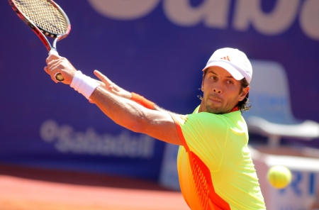 Spanish tennis player Fernando Verdasco in action during his match against Steve Darcis of Barcelona tennis tournament Conde de Godo on April 24, 2012 in Barcelonaのeditorial素材