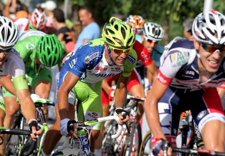 Liquigas Cannondale Italian cyclist Cristiano Salerno rides with the pack during the Vuelta Ciclista a Espana cycling race in Barcelona on August 26, 2012のeditorial素材