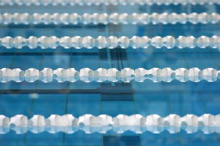 White lap lanes run across the swimming pool.の写真素材