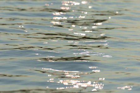 Close up look at the ripples and waves in the water.の写真素材