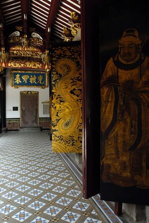 A buddhist temple in Singapore has lots of details on its walls.の写真素材