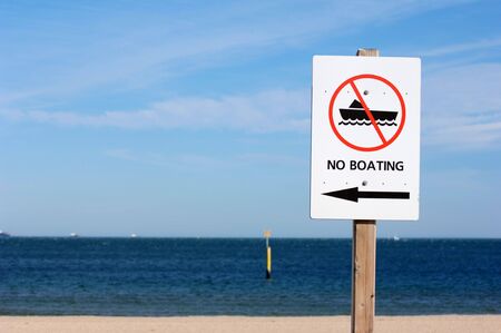 A \"No Boating\" sign on the beach.の写真素材