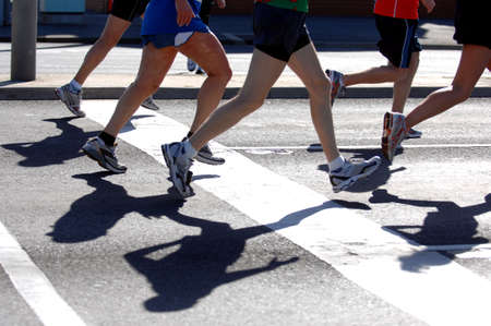 Groups of marathon runners in actionの写真素材