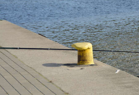 fishing rod over the pierの写真素材