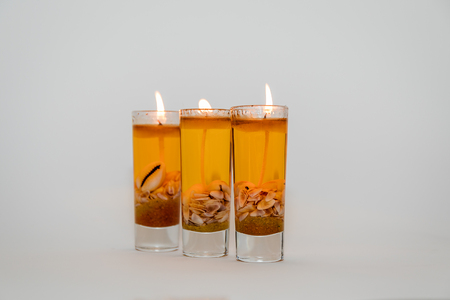 Three candles for decor and coziness in the house.の写真素材