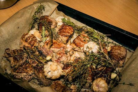 Fried meat on the baking sheet.の写真素材