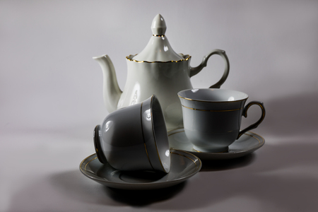 White Cup and coffee saucer. Coffee set. Cup of tea. The Cup on the table.の写真素材
