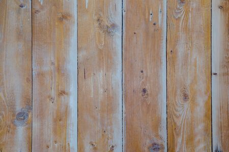 Old wood is not treated the Board. Background wood texture. Wood texture with knots and fibers.の写真素材