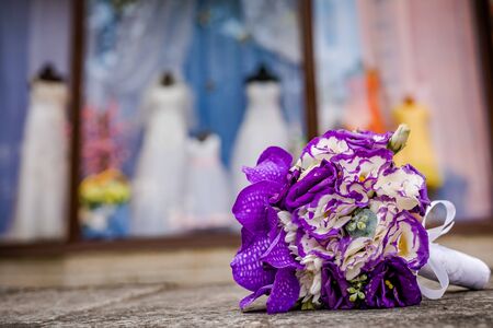 Beautiful bouquet of fresh flowers on a stone slab.の写真素材