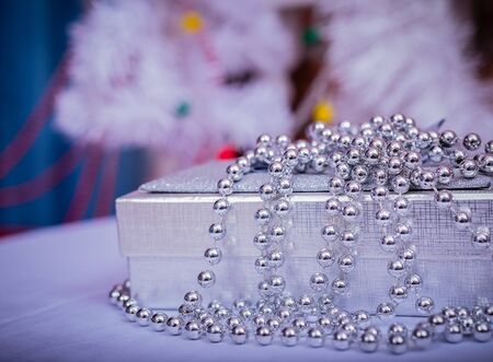 Toys for the new year. Christmas toy. Christmas toy. Toys on the Christmas tree. Christmas lights and candlesの写真素材