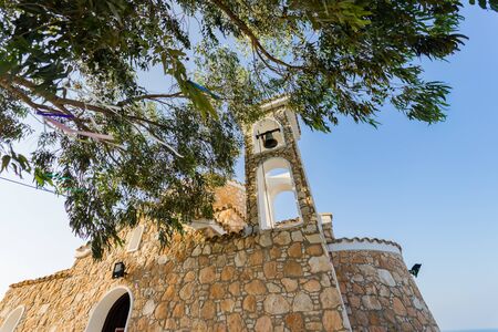 The Church of Profitis Elias is located on a hill overlooking the entire resort of Protaras in Cyprus.の写真素材