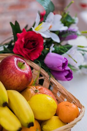Fruit in a basket. Apple, bananas, oranges. Dietary nutrition.の写真素材