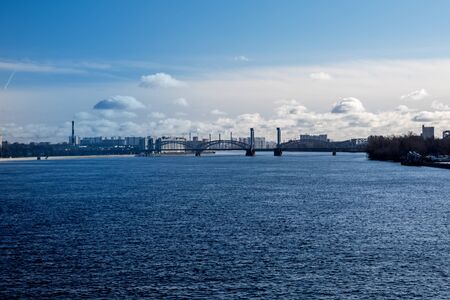 Panorama of the Neva river with a view of the Peter the Great bridge in Saint Petersburg.