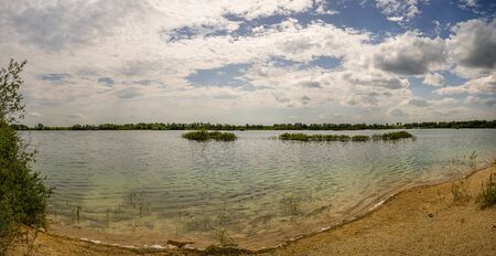 Spring landscape of a closed sand pit.の写真素材