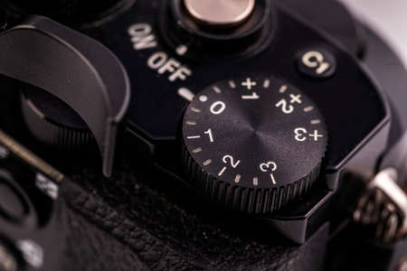 Macro close-up of the black body of the camera with buttons for control. Selective focus and a fragment of the framing.の写真素材