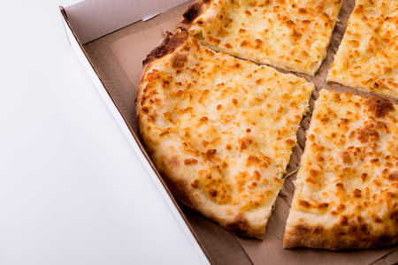 Georgian flatbread khachapuri cut into pieces.の写真素材