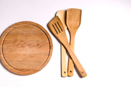 Cutting board and spatulas for cooking.の写真素材