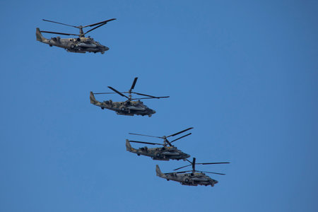 May 9, 2021 St. Petersburg. Russian military helicopters fly to participate in the Victory Day Parade.のeditorial素材