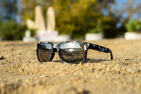 The sun and the sea are beautifully reflected in the glasses.の写真素材