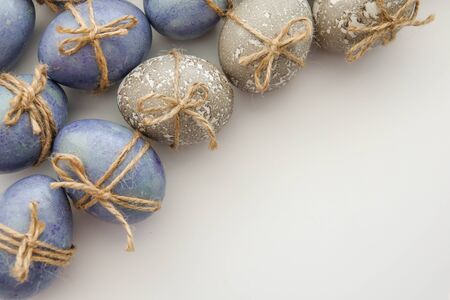 Colored grey and blue decorated Easter Eggsの写真素材